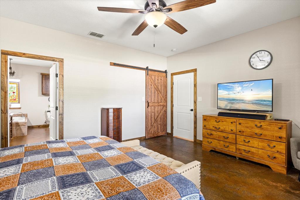 3761 County Road 149 Bluff Dale, TX 76433 - Photo 13 of 37 a living room with furniture and a flat screen tv