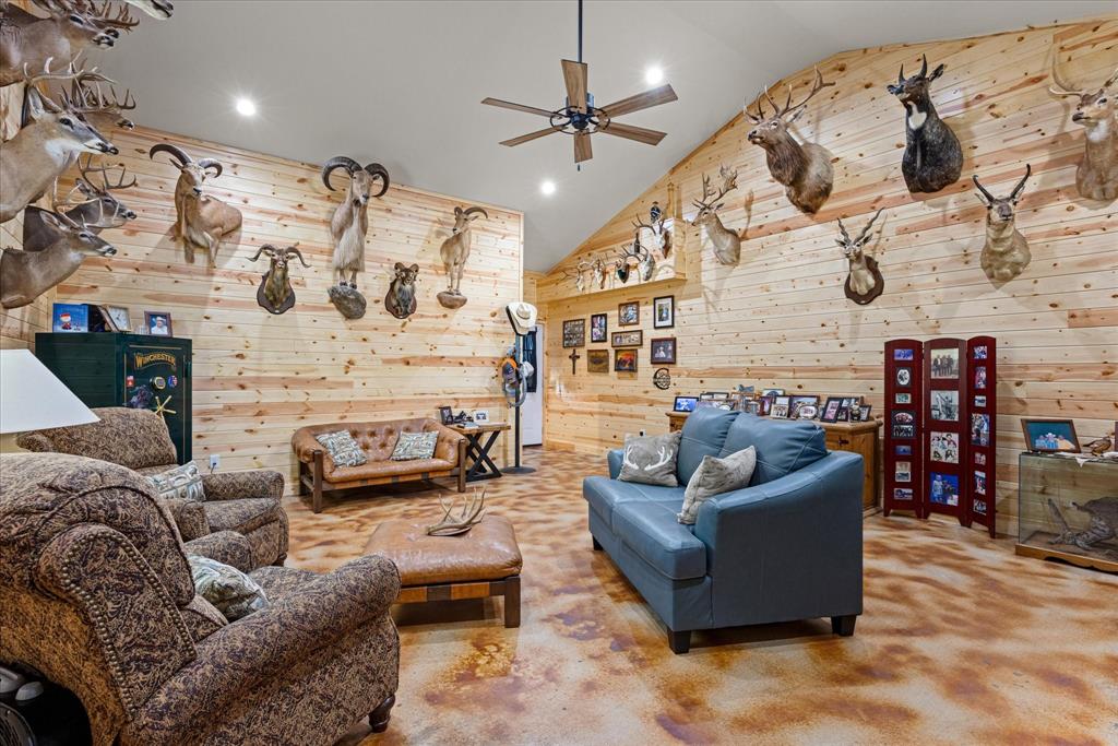 3761 County Road 149 Bluff Dale, TX 76433 - Photo 25 of 37 a living room with furniture and a flat screen tv