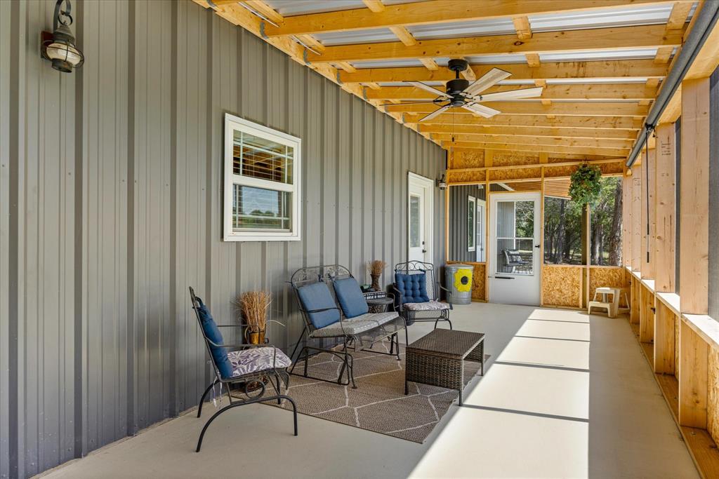 3761 County Road 149 Bluff Dale, TX 76433 - Photo 26 of 37 a building outdoor space with patio furniture