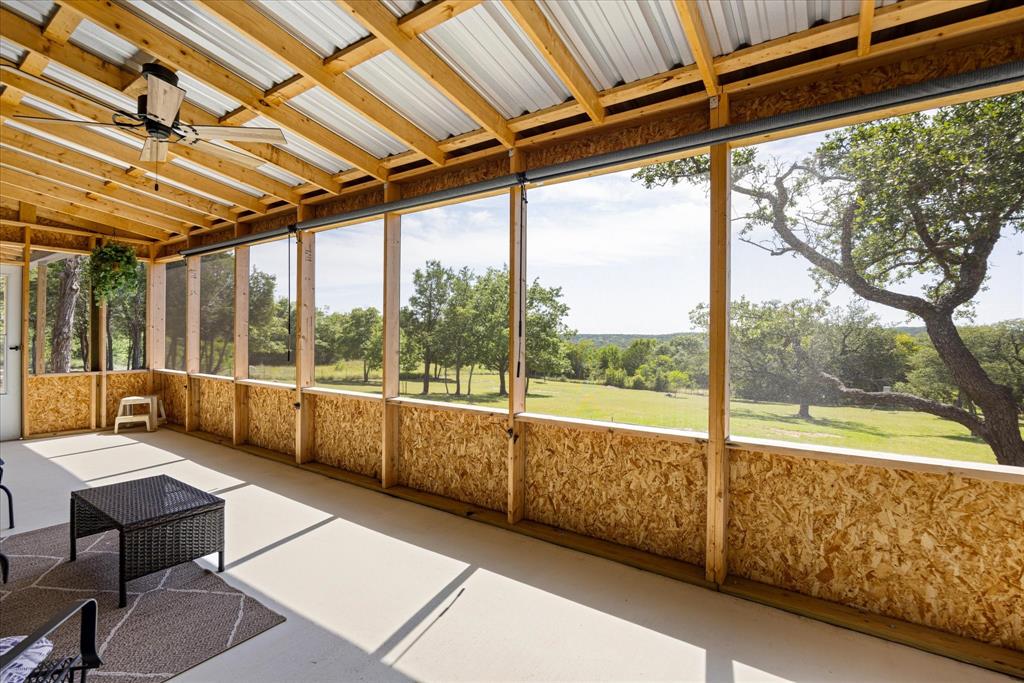 3761 County Road 149 Bluff Dale, TX 76433 - Photo 27 of 37 a building outdoor space with seating