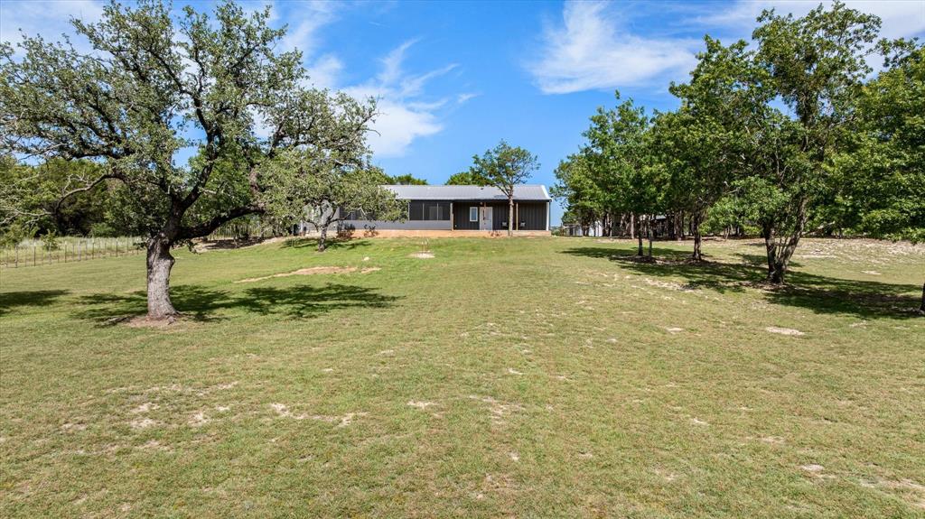 3761 County Road 149 Bluff Dale, TX 76433 - Photo 35 of 37 a view of a backyard