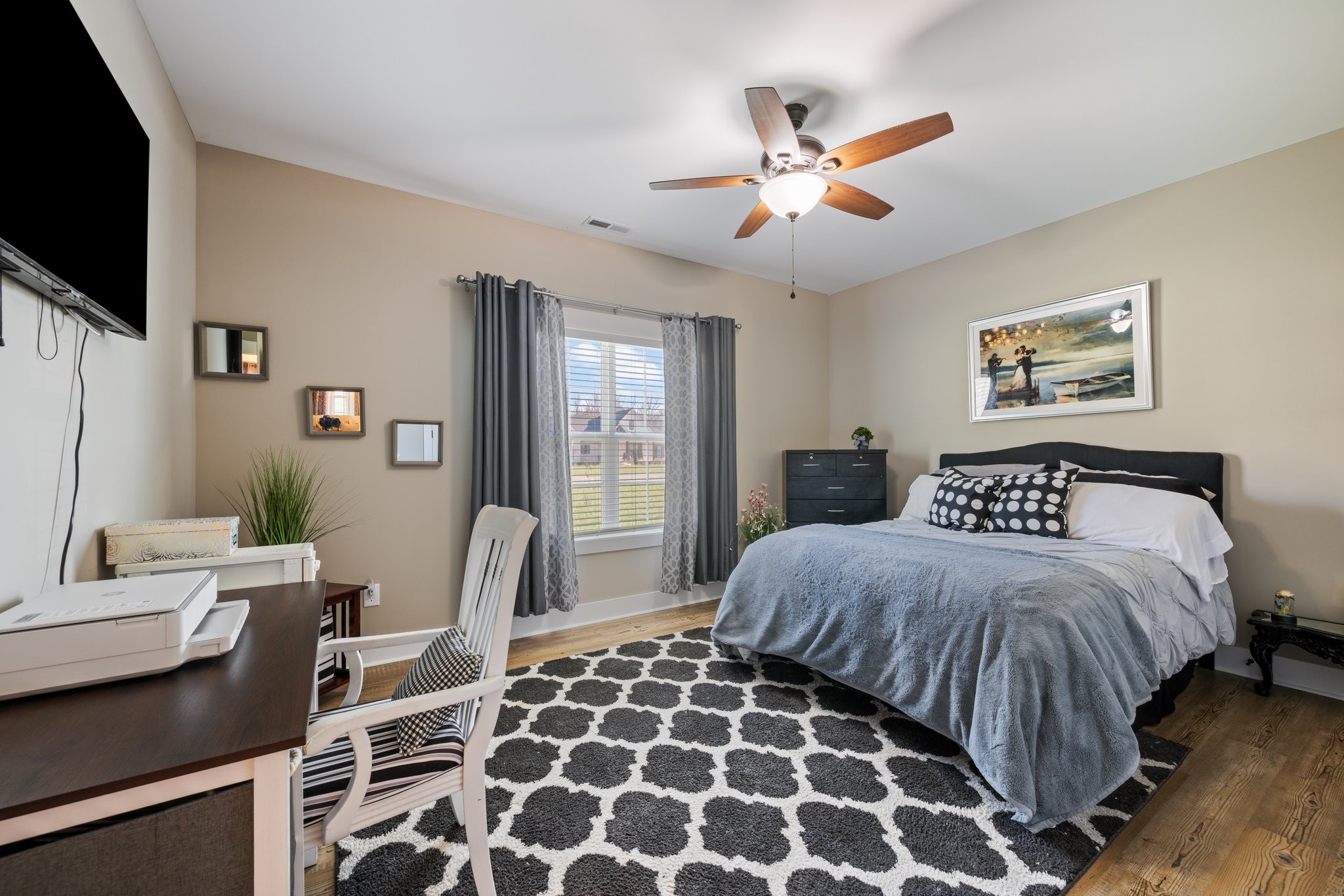 1357 Norton Road Manchester, TN 37355 - Photo 19 of 29 a bedroom with a large bed and a flat screen tv