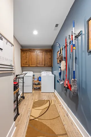 a living room filled with furniture and a flat screen tv