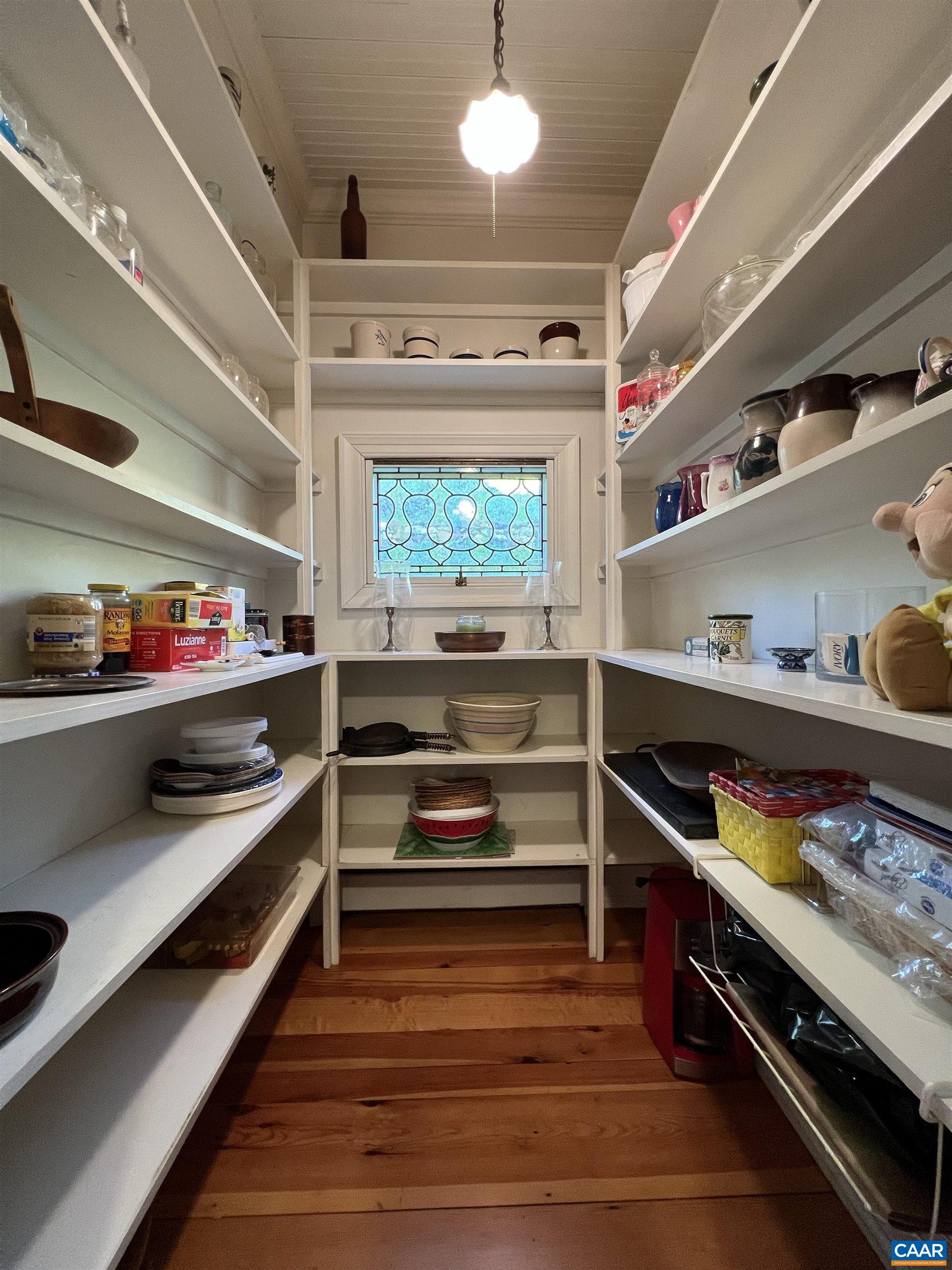 6742 Plank Road Charlottesville, VA 22903 - Photo 16 of 61 a storage room with stainless steel appliances wooden floor and window