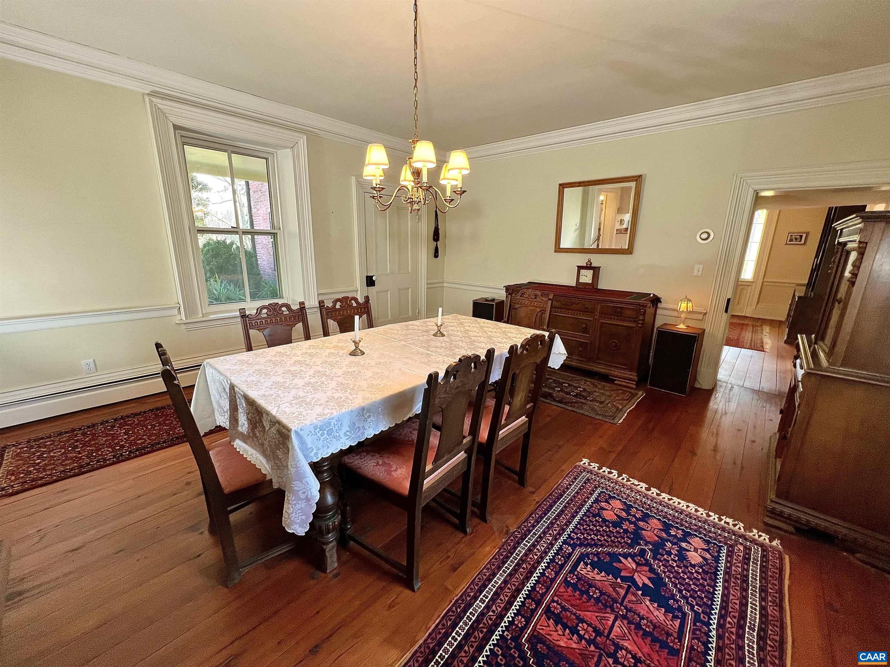 6742 Plank Road Charlottesville, VA 22903 - Photo 20 of 61 a view of a dining room with furniture window and wooden floor