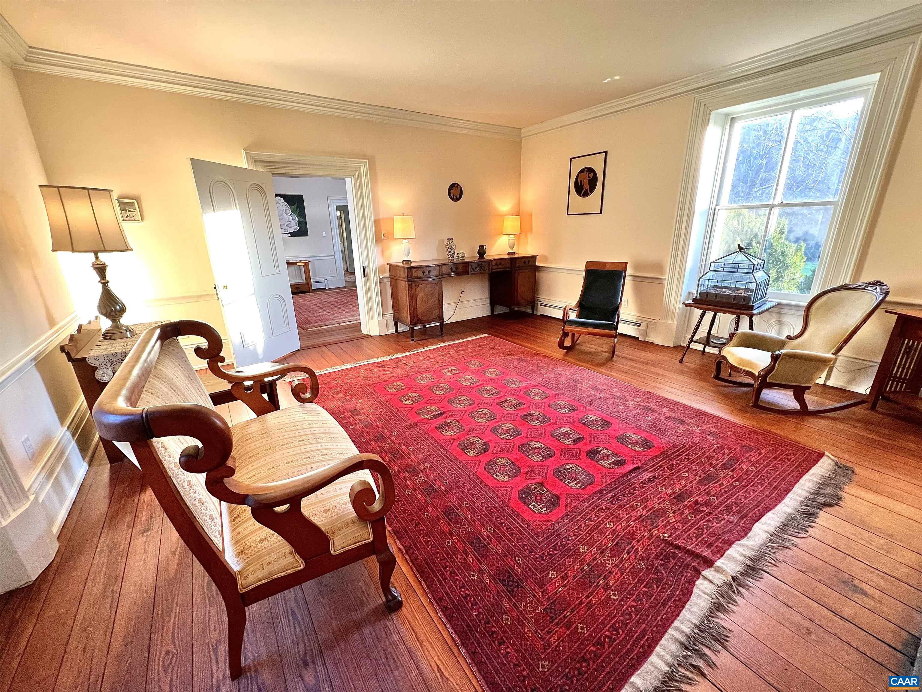 6742 Plank Road Charlottesville, VA 22903 - Photo 24 of 61 a bedroom with furniture and a large window