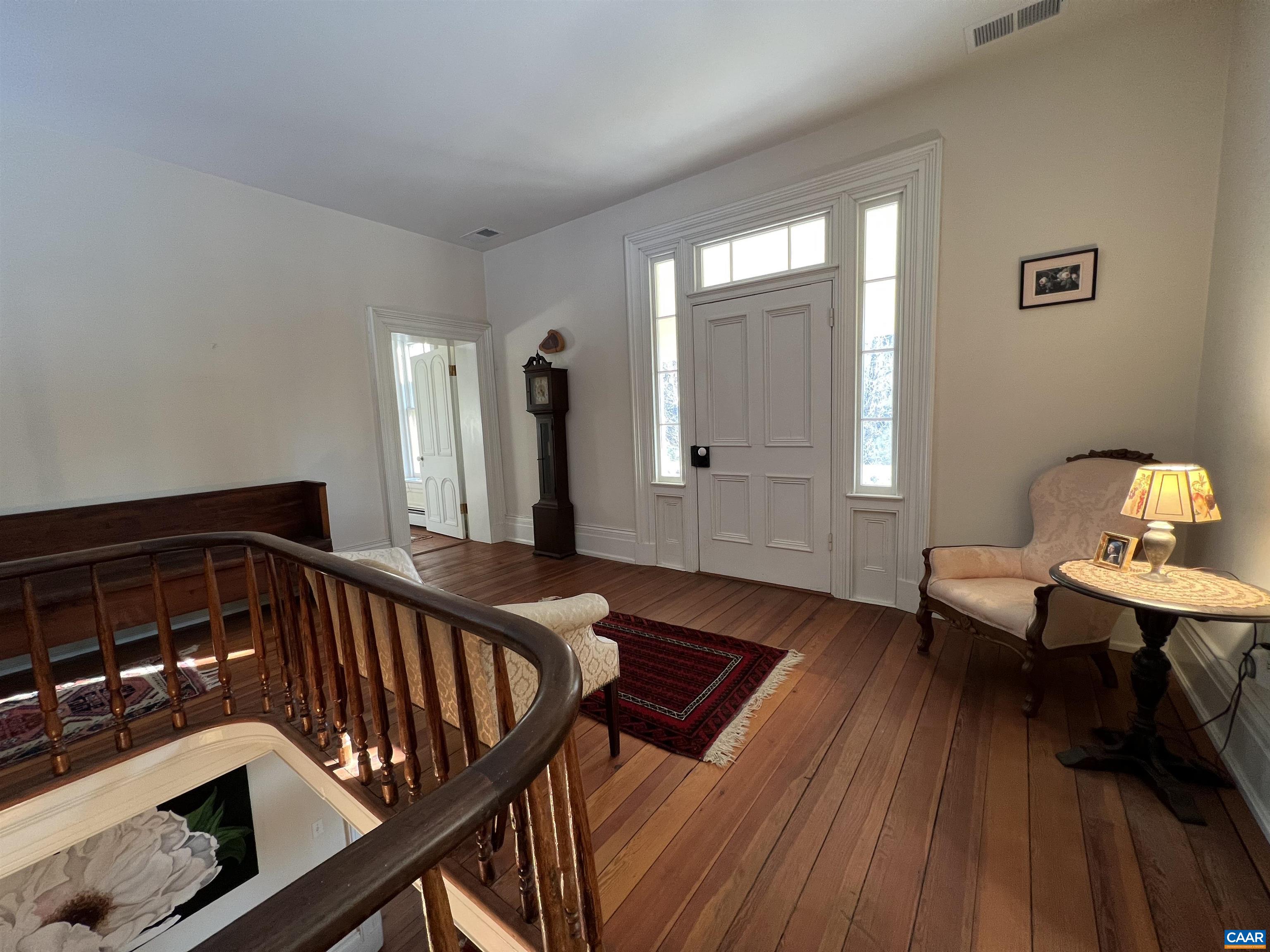 6742 Plank Road Charlottesville, VA 22903 - Photo 25 of 61 a view of a livingroom with furniture and wooden floor