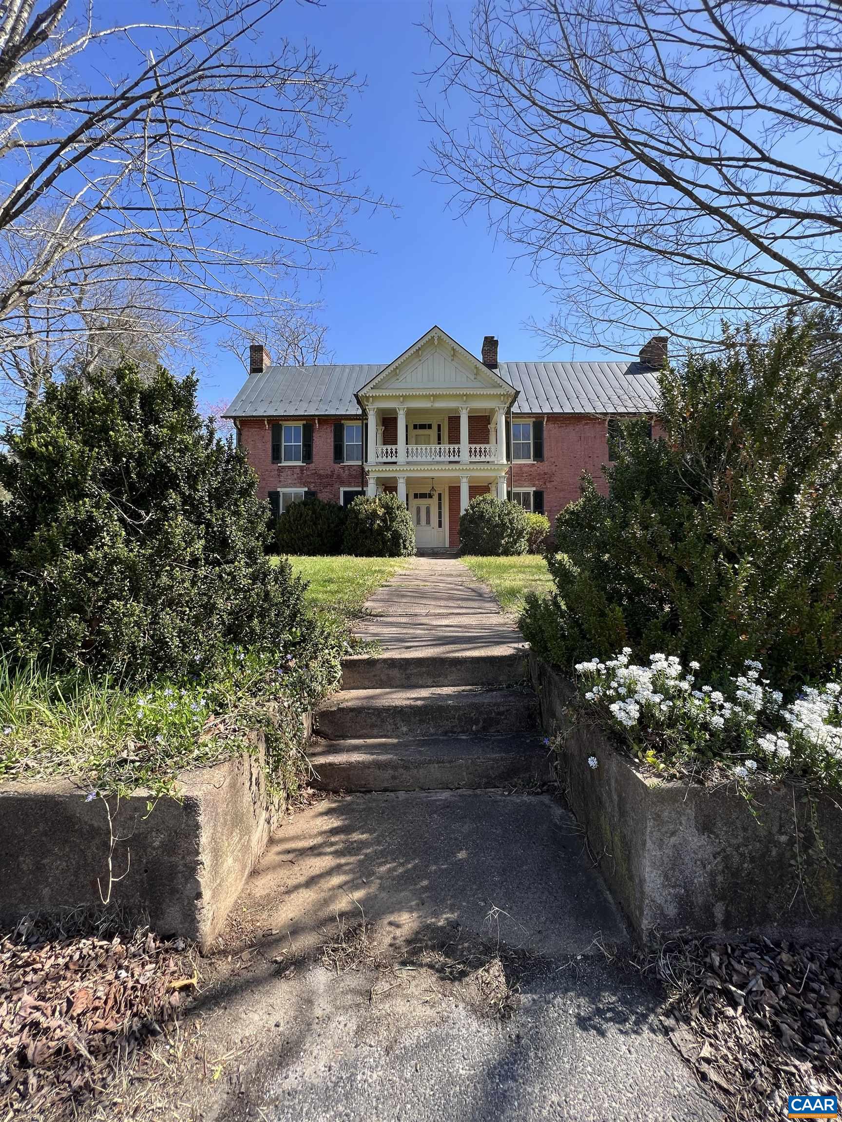 6742 Plank Road Charlottesville, VA 22903 - Photo 3 of 61 a front view of a house with a yard