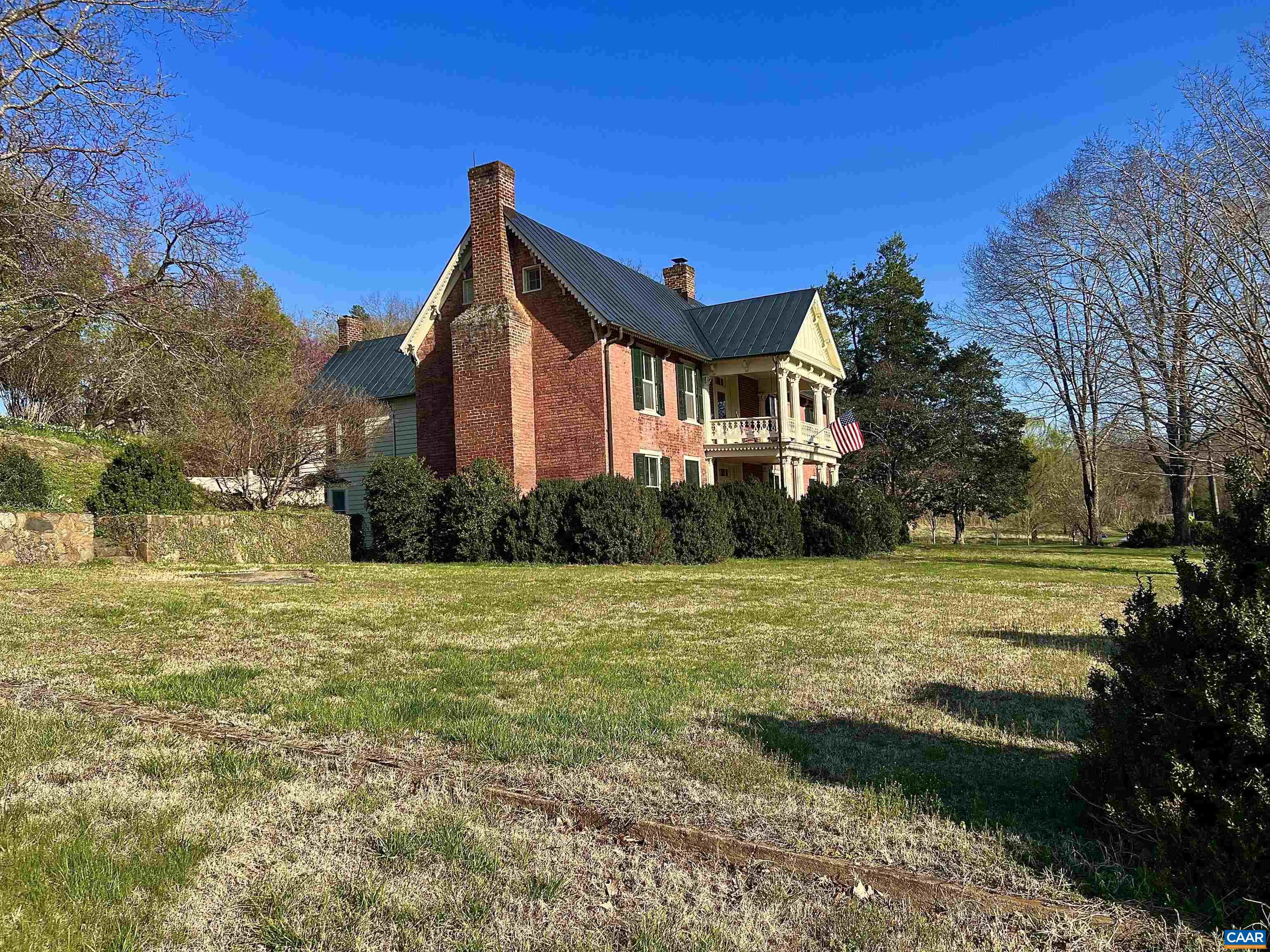 6742 Plank Road Charlottesville, VA 22903 - Photo 6 of 61 a front view of a house with a yard