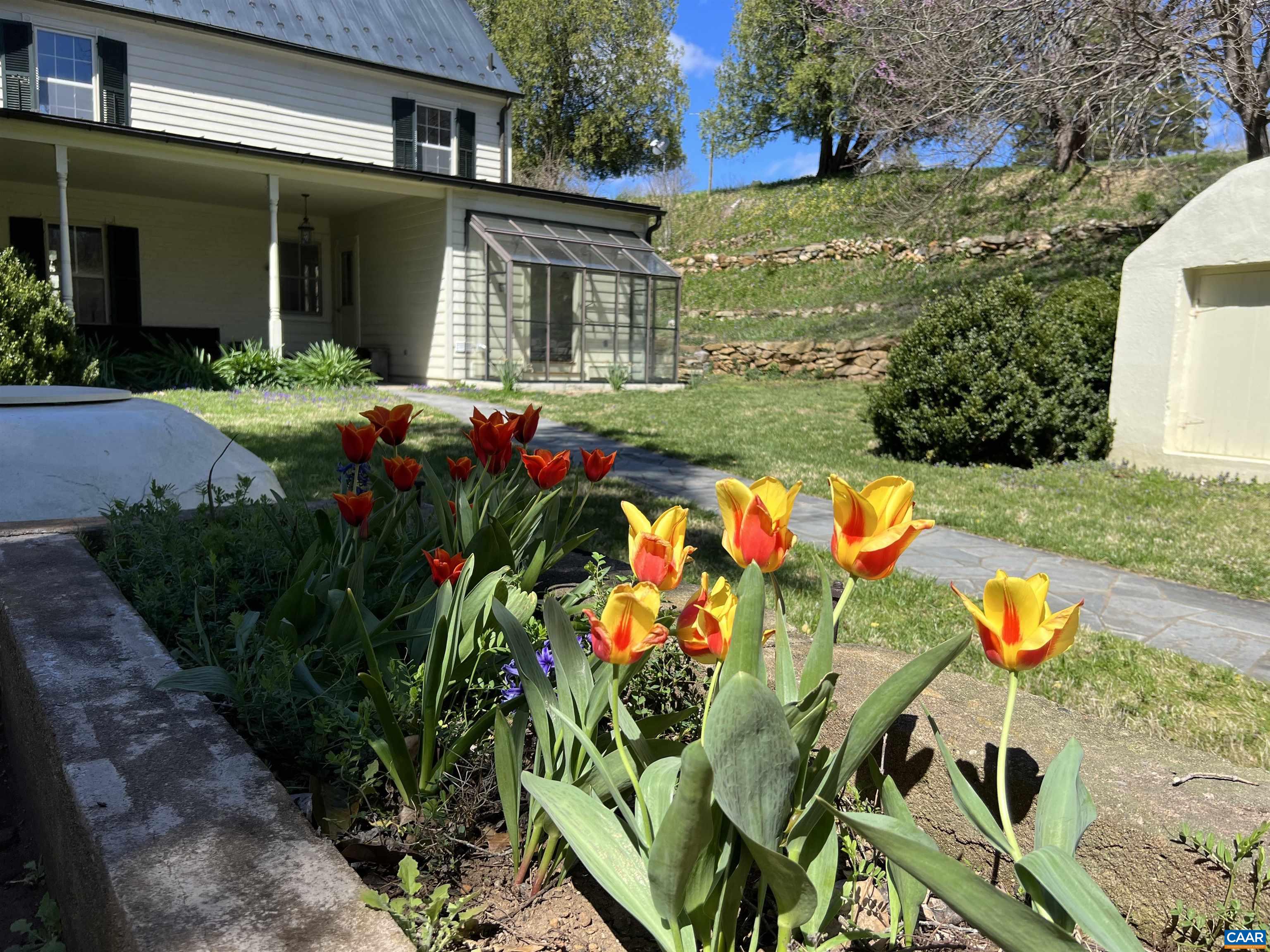 6742 Plank Road Charlottesville, VA 22903 - Photo 10 of 61 front view of a house with a big yard