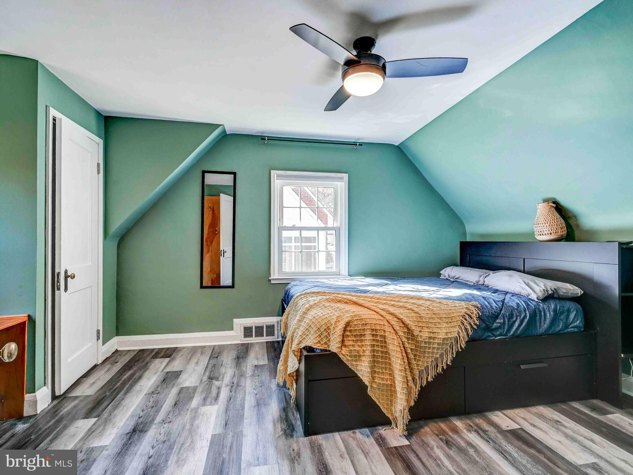913 Adana Road Baltimore, MD 21208 - Photo 16 of 26 a bedroom with bed and window