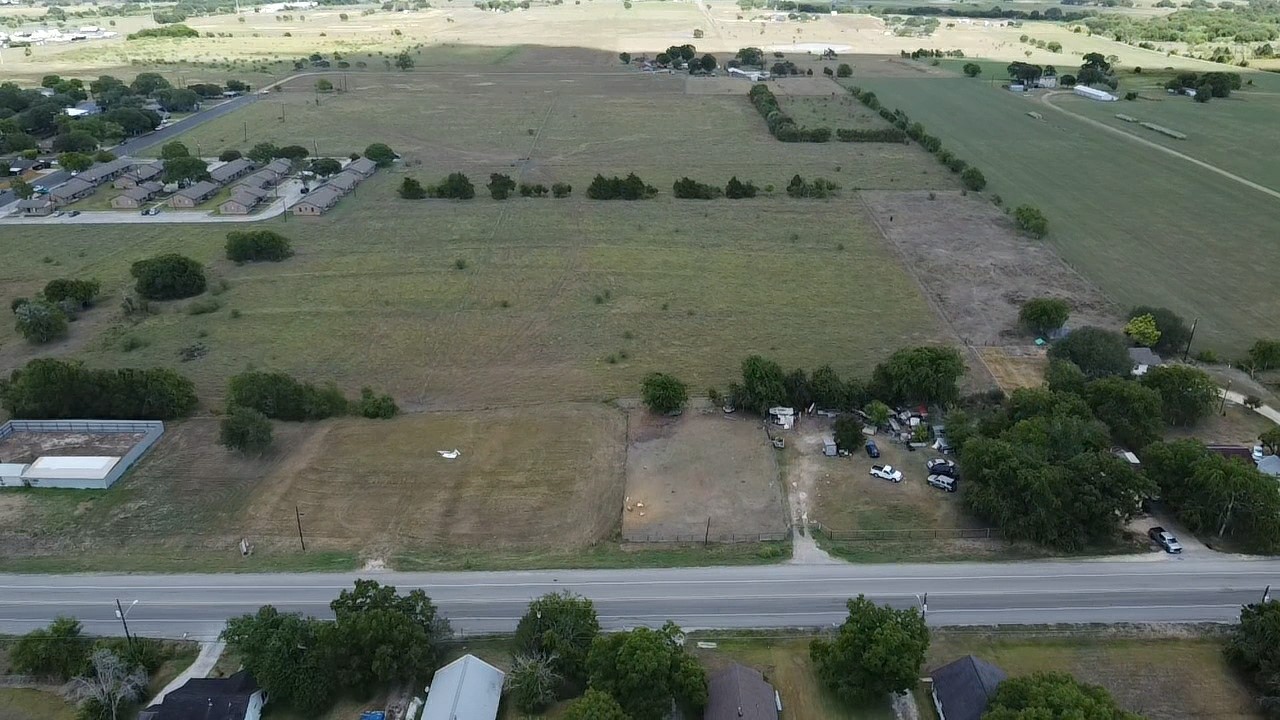 0 Highway 77 Schulenburg, TX 78956 - Photo 6 of 11 an aerial view of a house with a yard