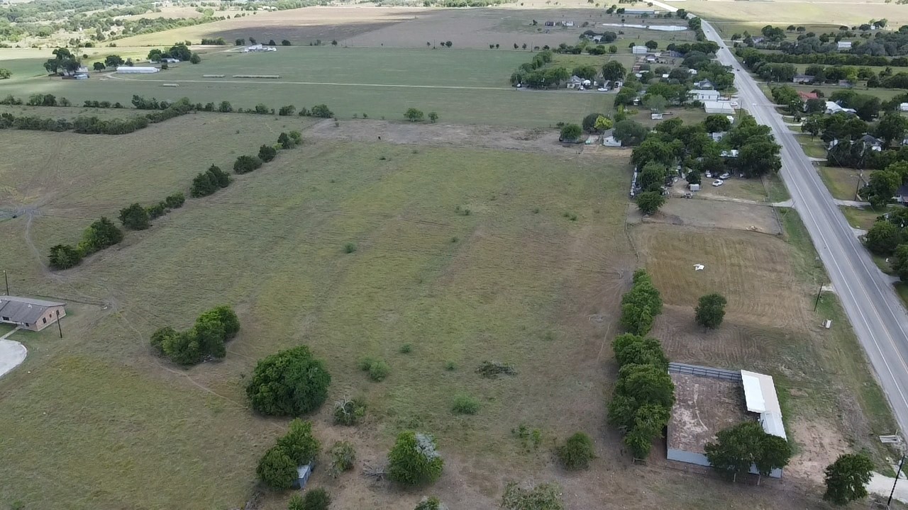 0 Highway 77 Schulenburg, TX 78956 - Photo 8 of 11 an aerial view of a house with a yard