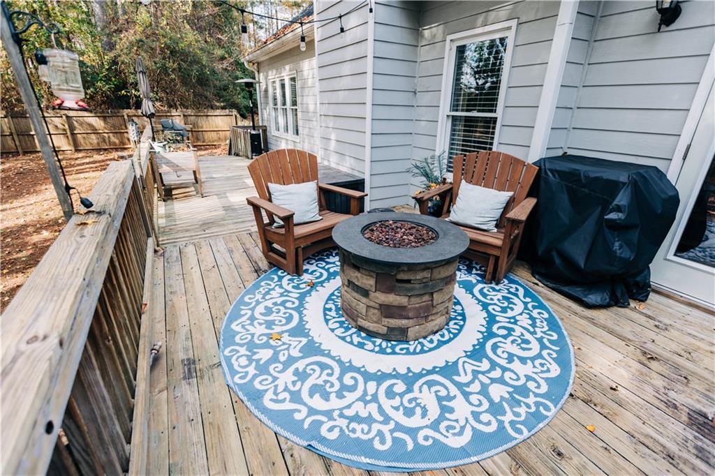 2533 Gold Hill Court Villa Rica, GA 30180 - Photo 17 of 50 a view of a balcony with table and chairs