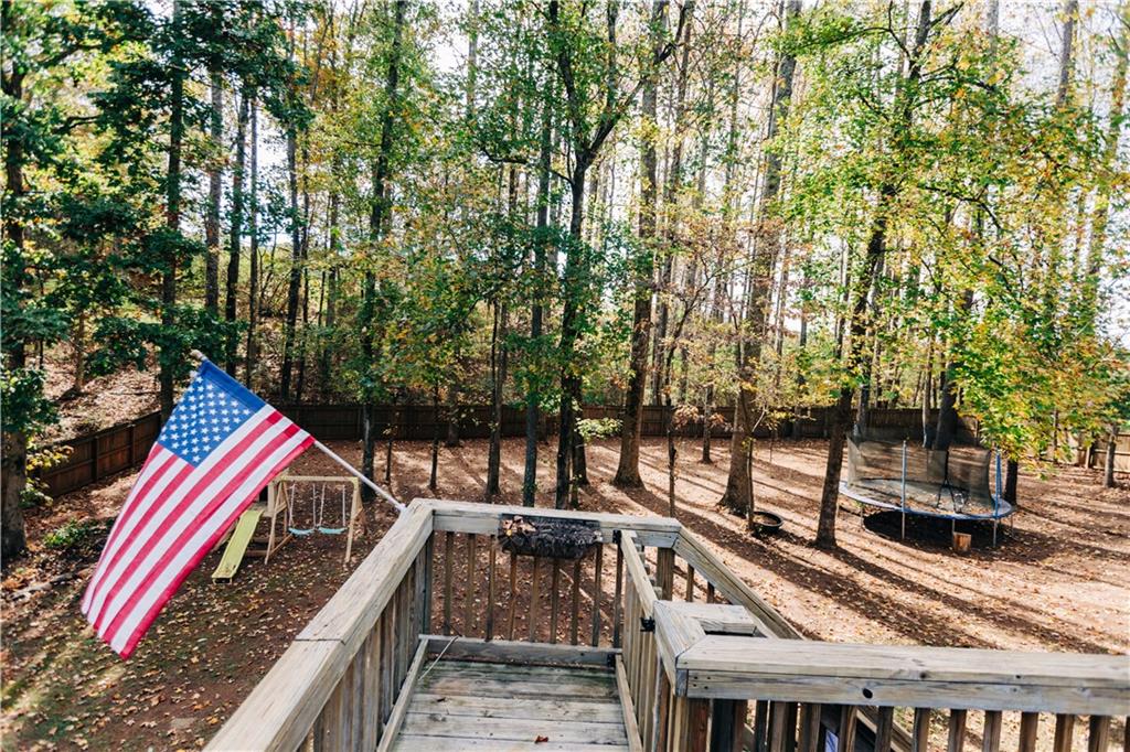 2533 Gold Hill Court Villa Rica, GA 30180 - Photo 18 of 50 a view of stairs and with a yard