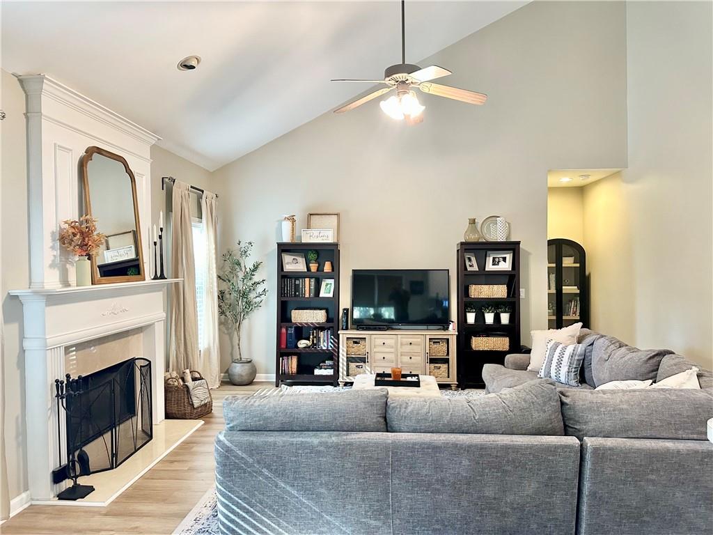 2533 Gold Hill Court Villa Rica, GA 30180 - Photo 21 of 50 a living room with furniture and a fireplace