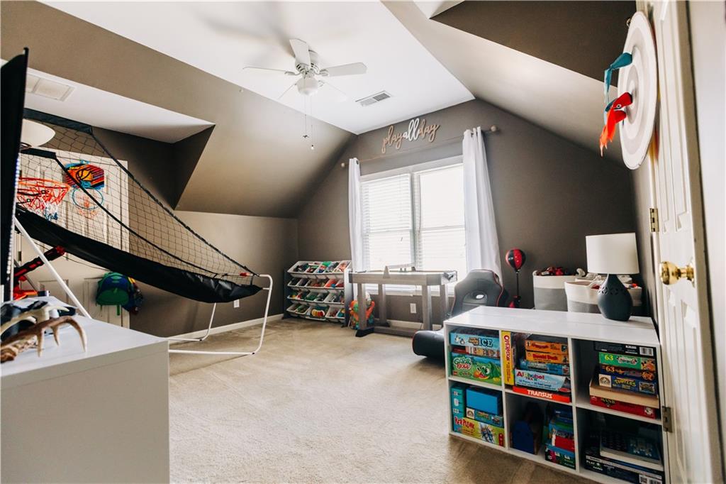 2533 Gold Hill Court Villa Rica, GA 30180 - Photo 31 of 50 a bedroom with furniture and a window