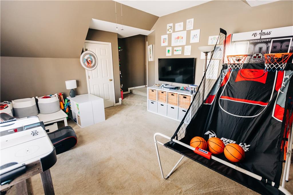 2533 Gold Hill Court Villa Rica, GA 30180 - Photo 32 of 50 a living room with furniture and a flat screen tv