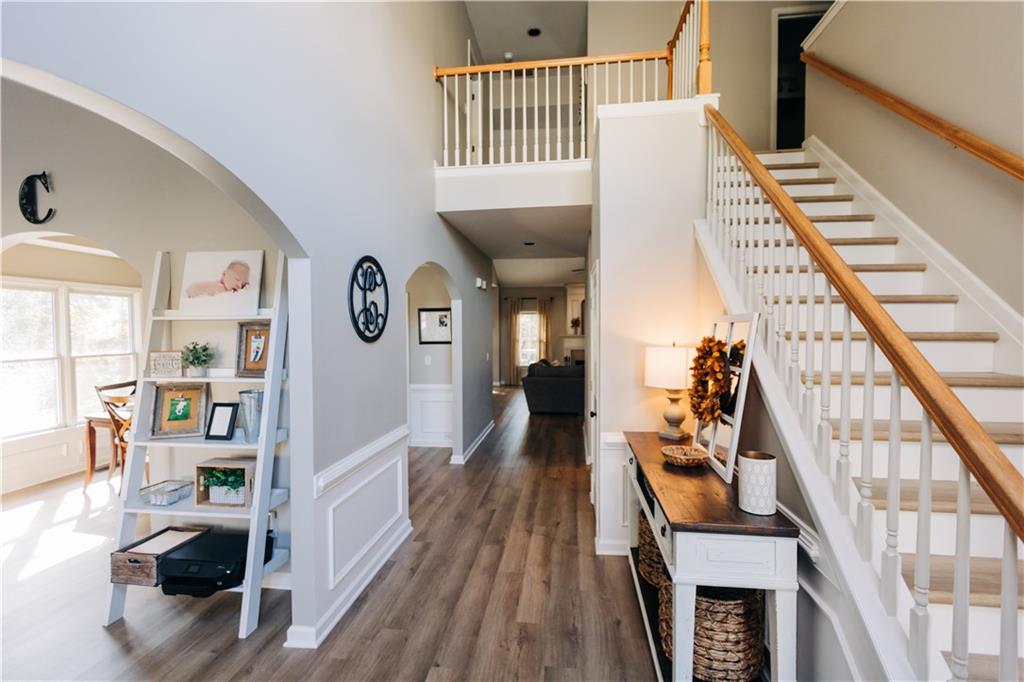 2533 Gold Hill Court Villa Rica, GA 30180 - Photo 5 of 50 a view of a living room with furniture and wooden floor
