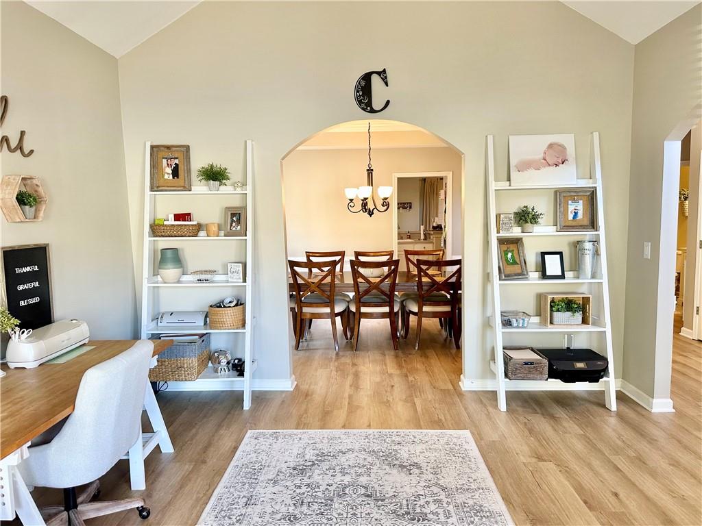 2533 Gold Hill Court Villa Rica, GA 30180 - Photo 8 of 50 a living room with furniture and a wooden floor