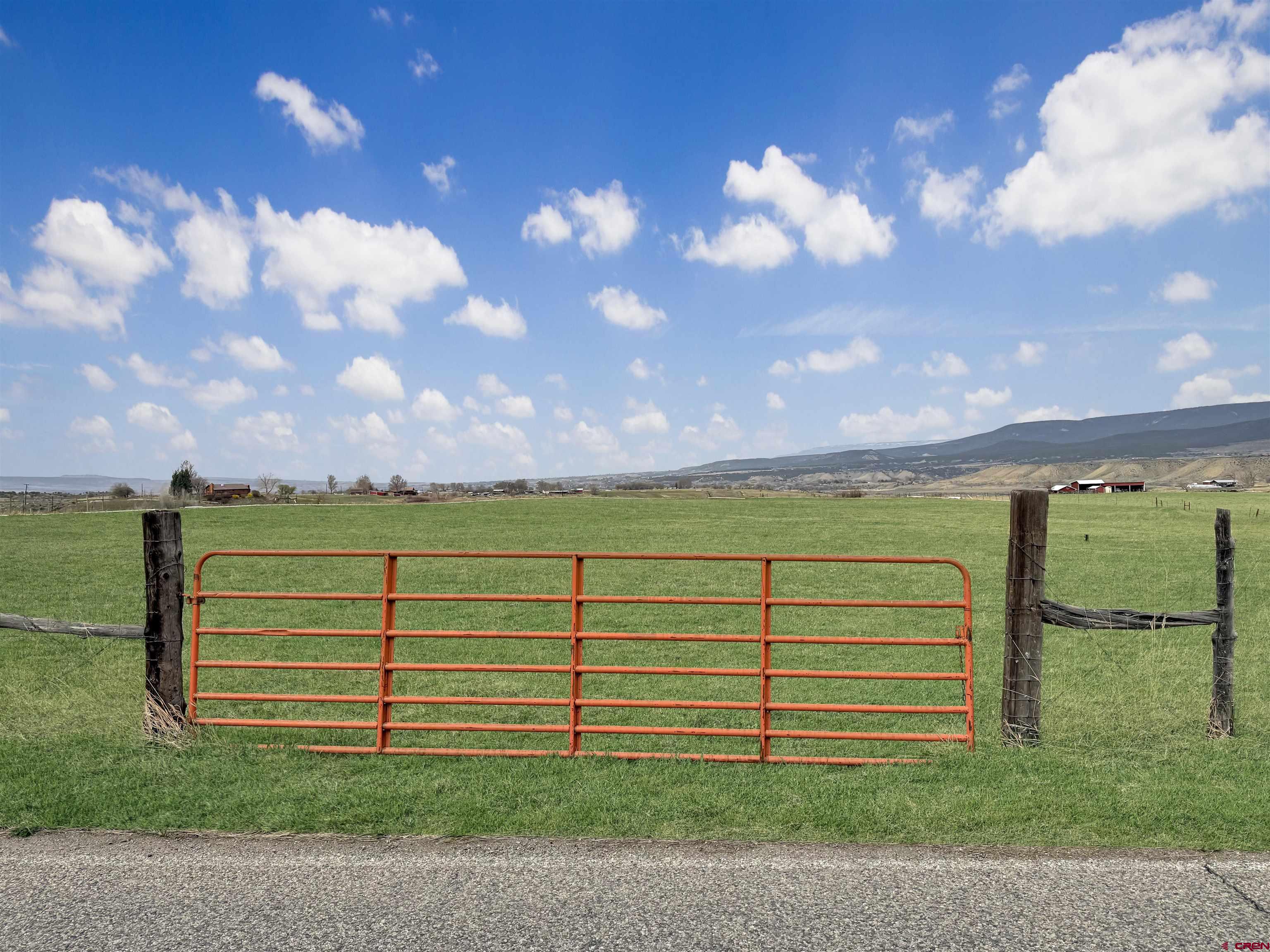 11545 Crawford Road Paonia, CO 81428 - Photo 12 of 45 a view of a road with a yard in front of it