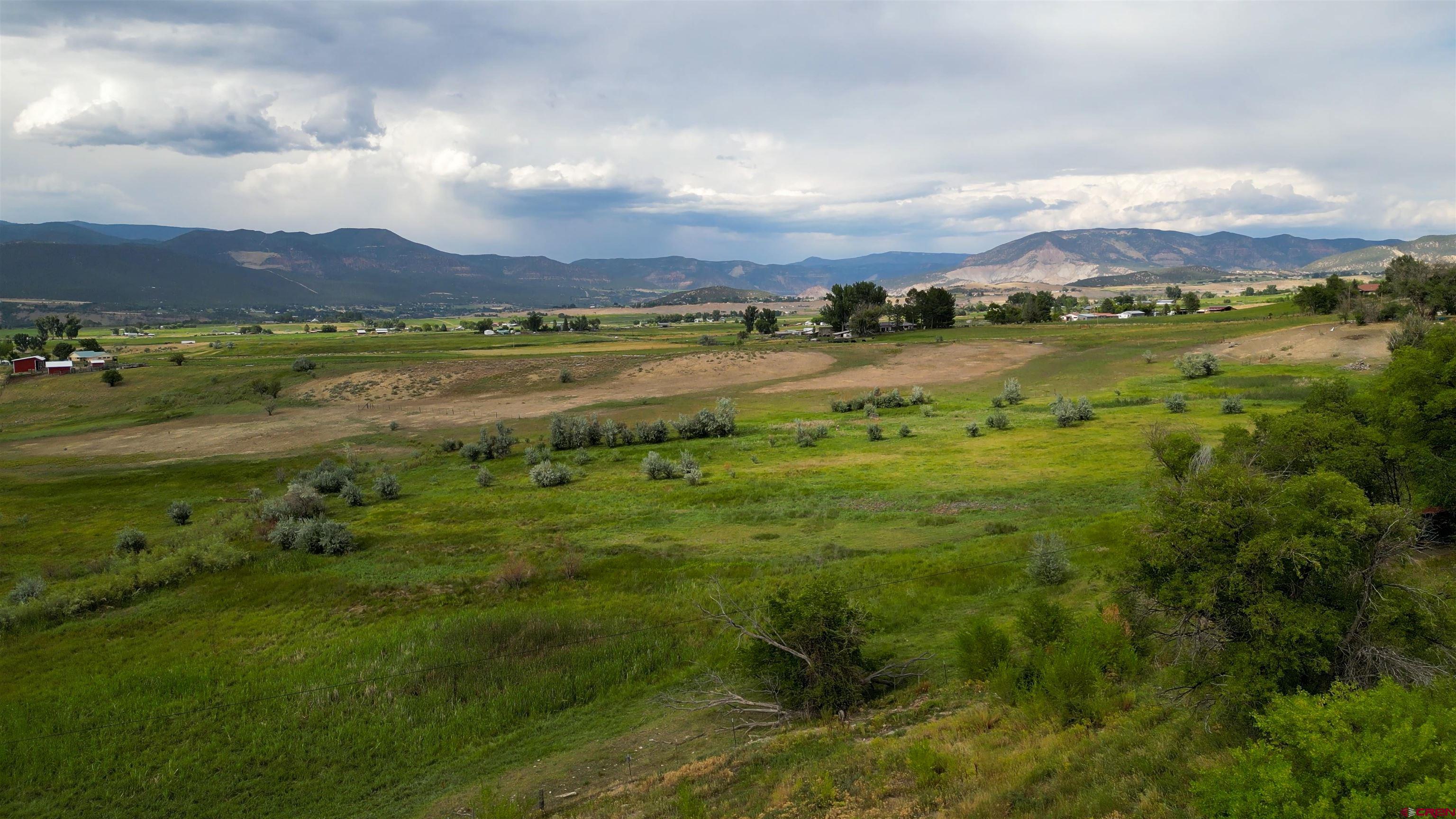 11545 Crawford Road Paonia, CO 81428 - Photo 17 of 45 a view of a city with mountains in the background