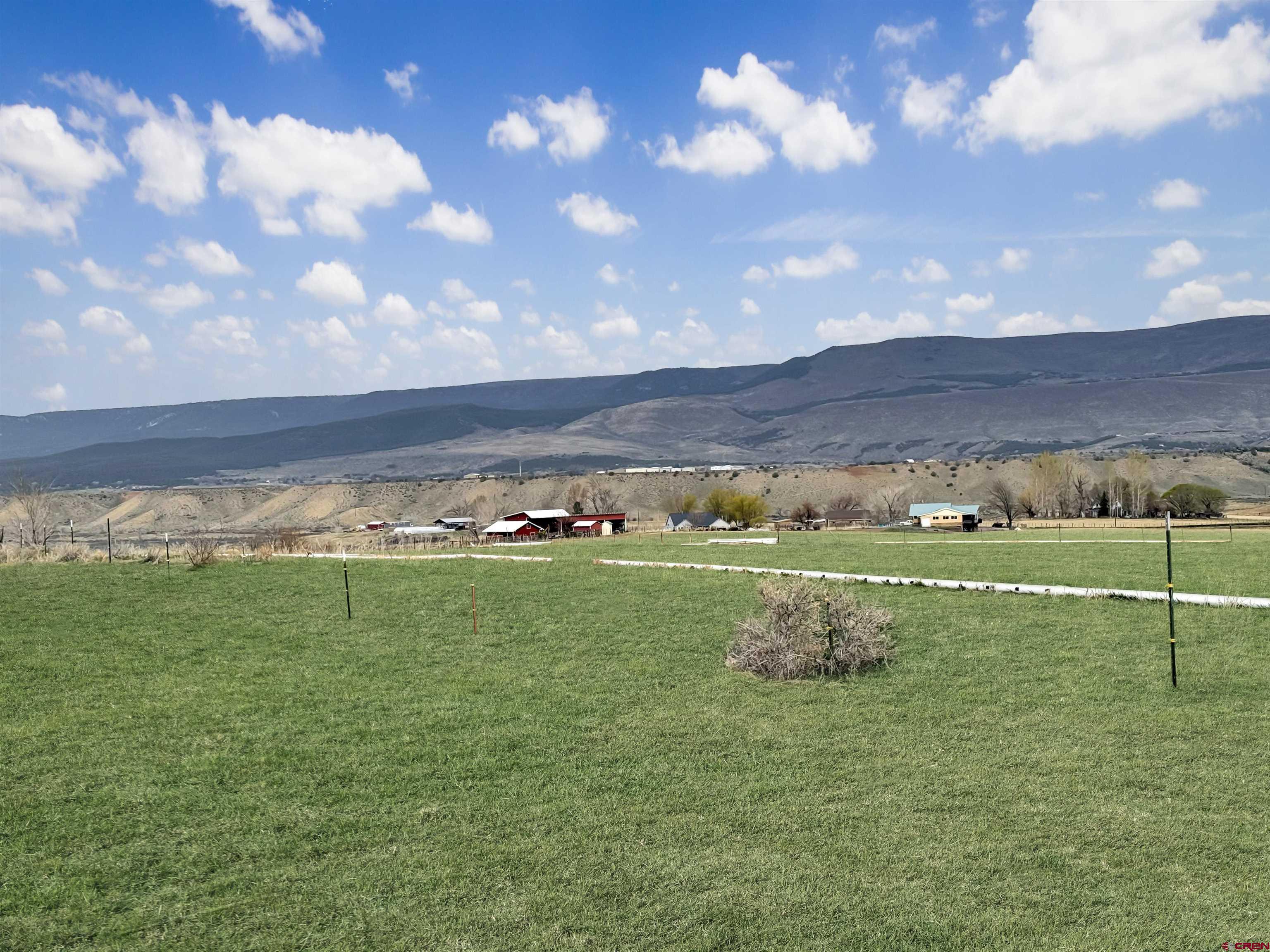 11545 Crawford Road Paonia, CO 81428 - Photo 19 of 45 a view of a golf course with a lake