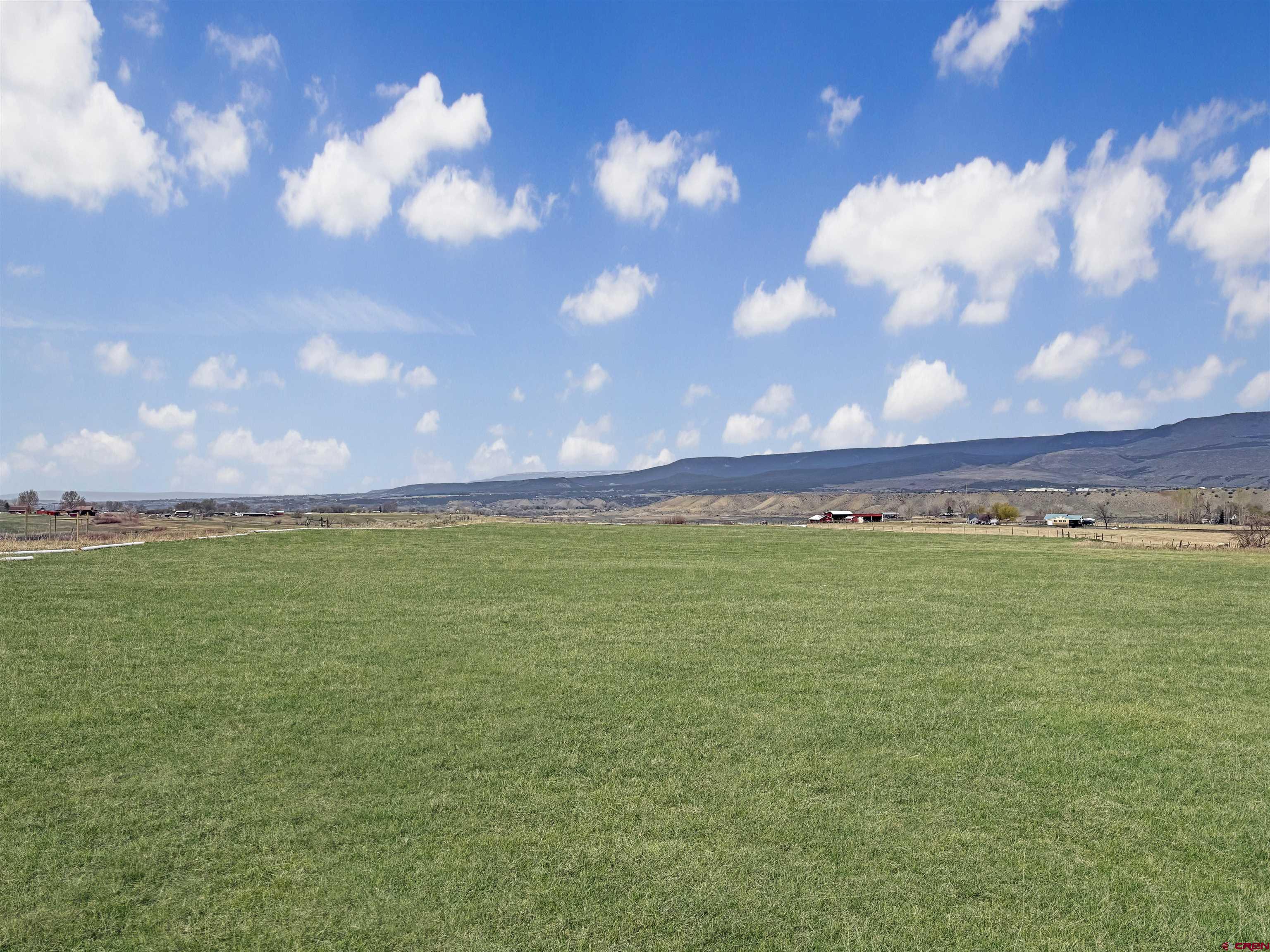 11545 Crawford Road Paonia, CO 81428 - Photo 21 of 45 a view of an ocean and a yard