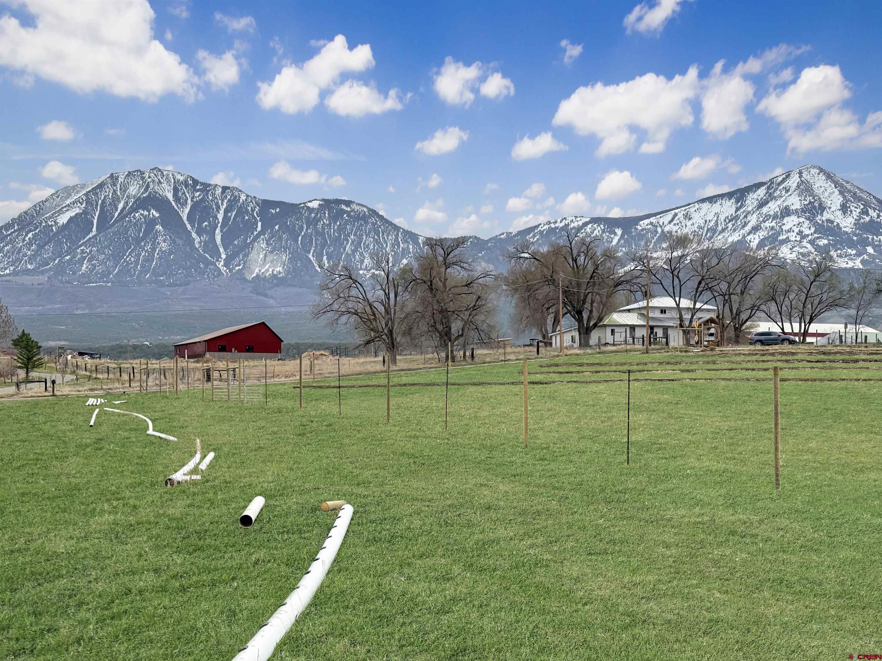 11545 Crawford Road Paonia, CO 81428 - Photo 27 of 45 a view of a golf course with a house