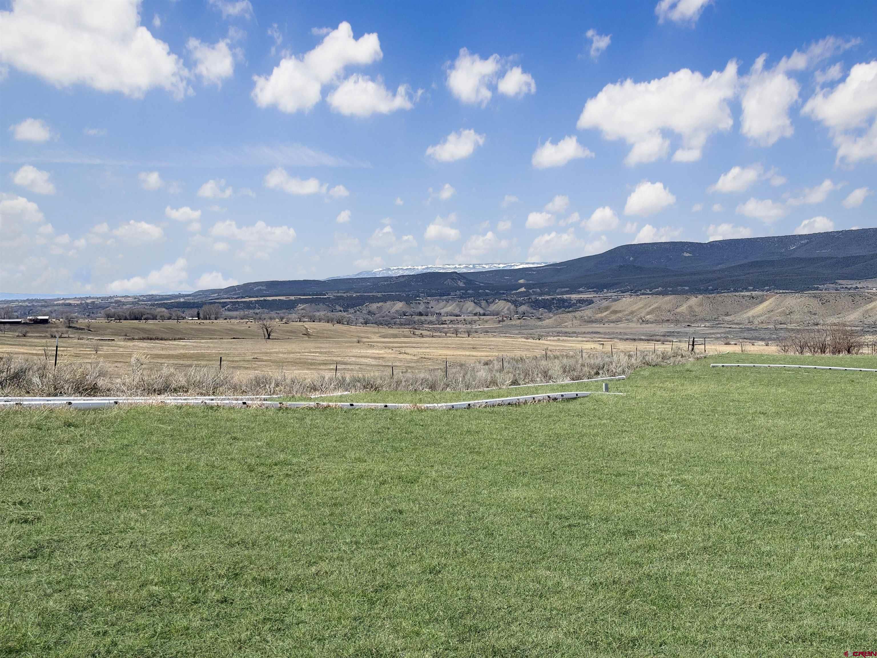 11545 Crawford Road Paonia, CO 81428 - Photo 5 of 45 a view of a lake with sunset in background