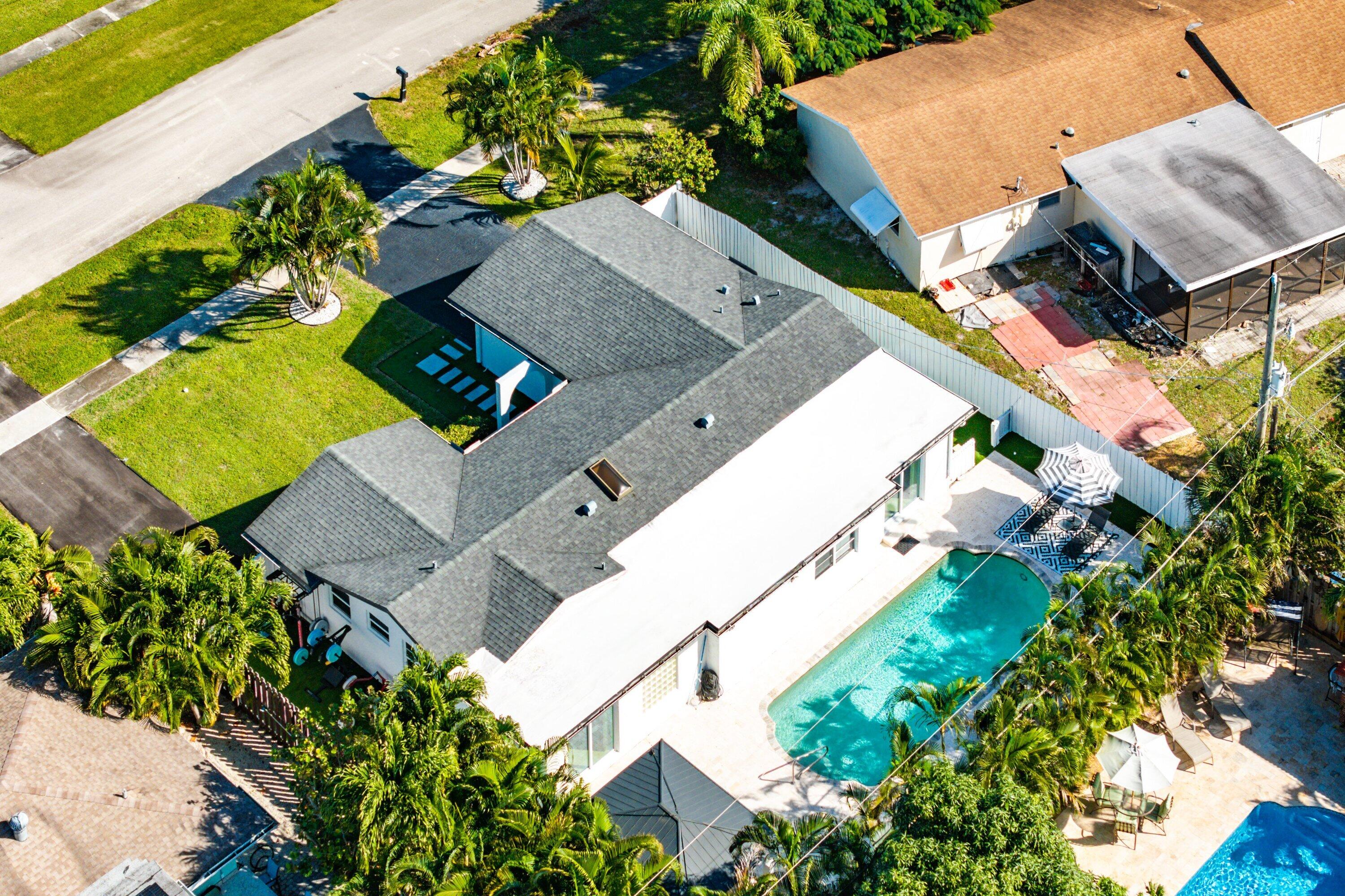 124 Oregon Lane Boca Raton, FL 33487 - Photo 38 of 41 an aerial view of a house with a yard
