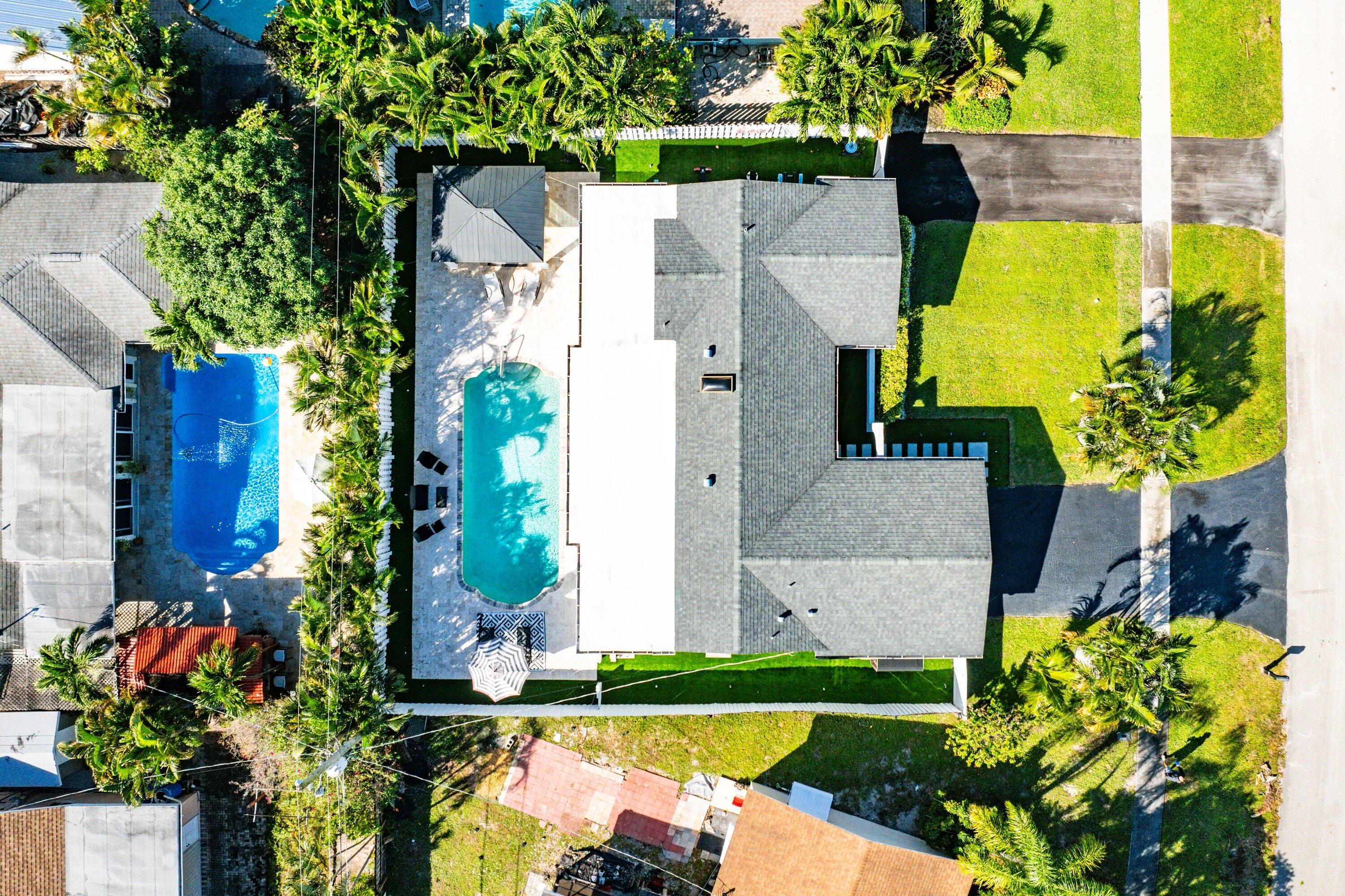 124 Oregon Lane Boca Raton, FL 33487 - Photo 39 of 41 an aerial view of a house with a yard and a fountain