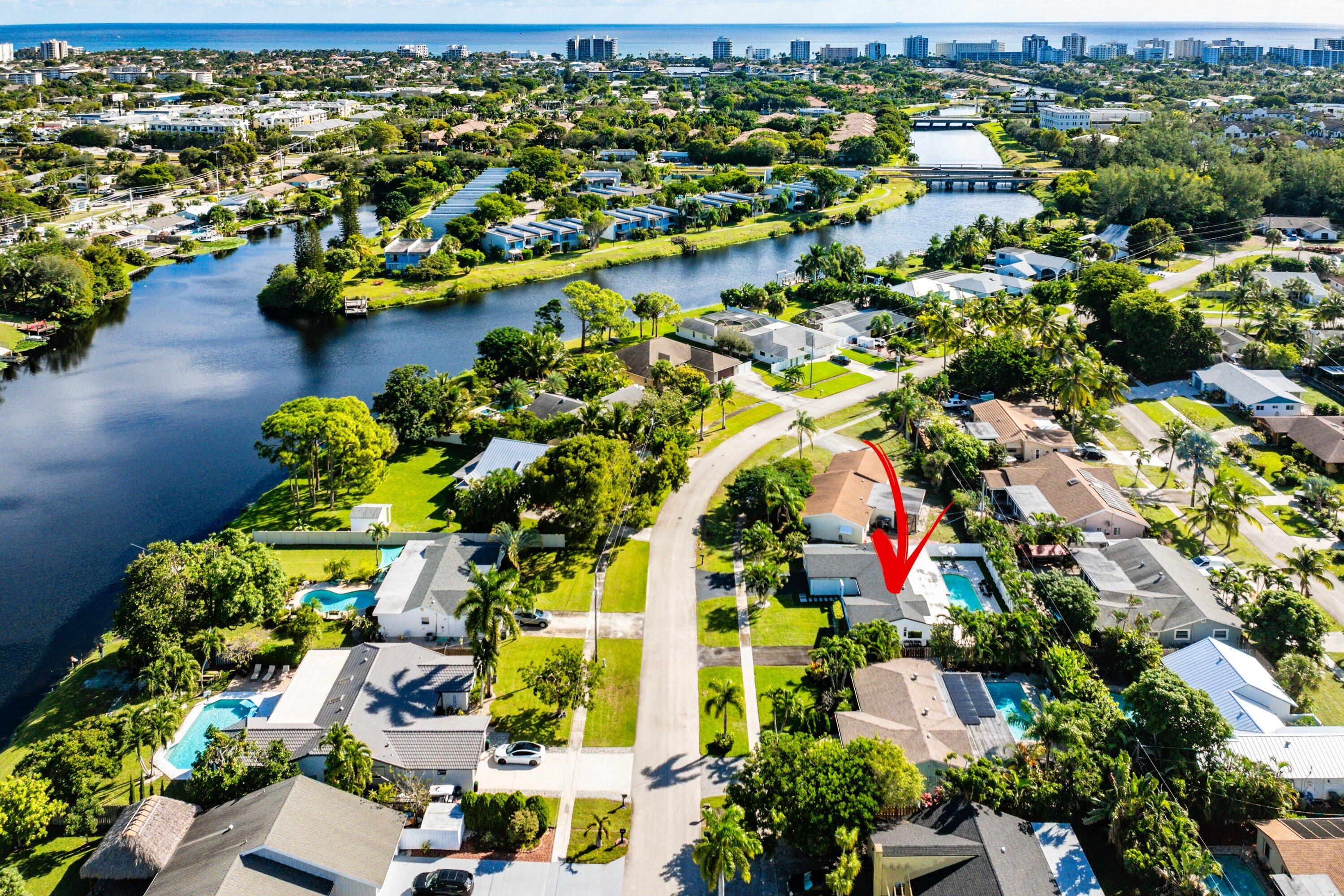 124 Oregon Lane Boca Raton, FL 33487 - Photo 40 of 41 an aerial view of residential houses with outdoor space