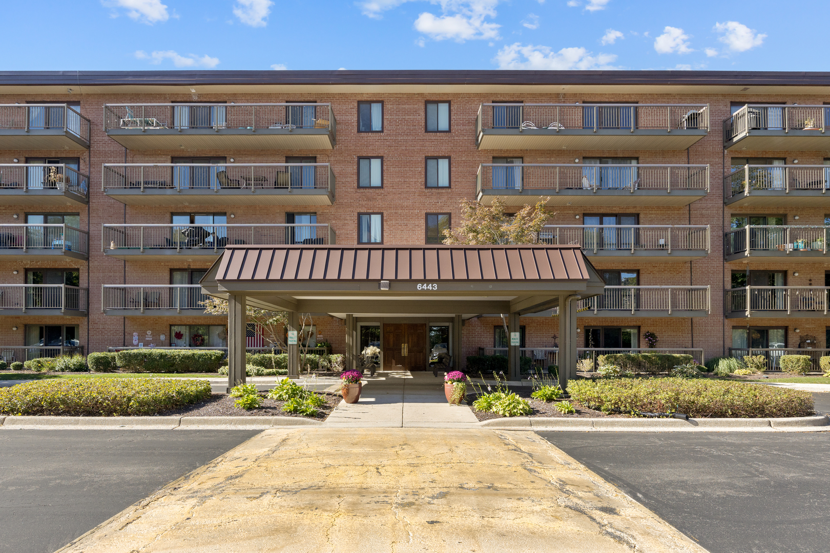 a view of building with an outdoor space and seating area