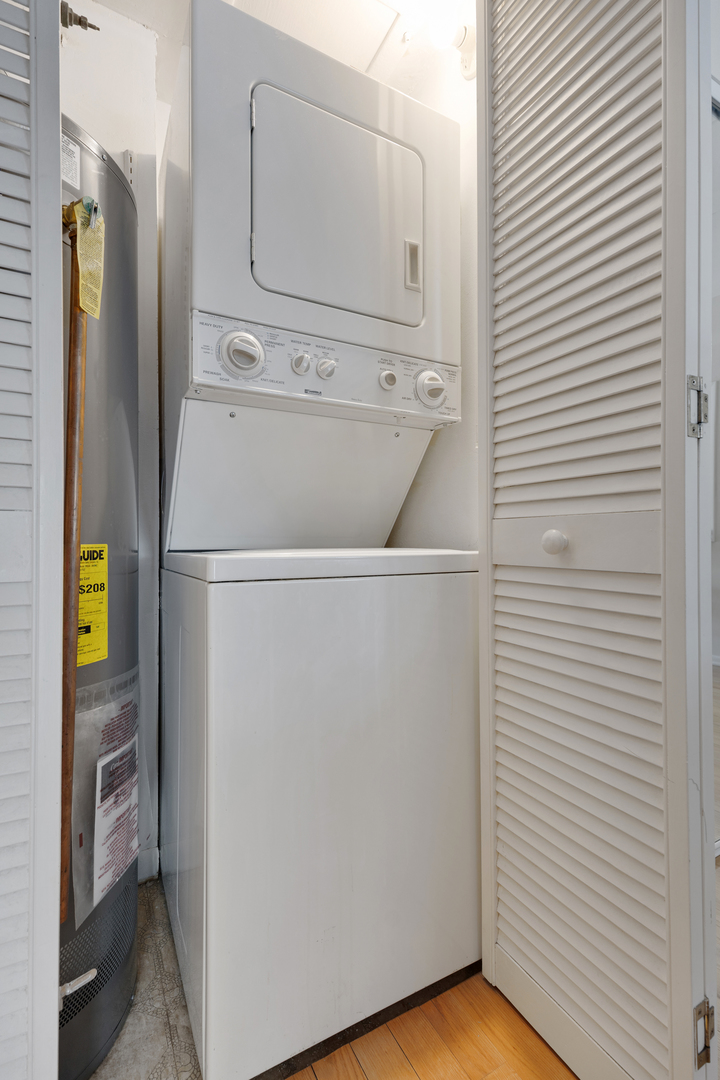 6443 Clarendon Hills Road, Unit 206 Willowbrook, IL 60527 - Photo 15 of 21 a close view of a refrigerator in kitchen and painted walls