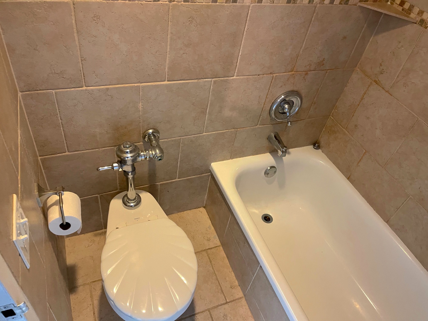 300 North State Street, Unit 2427 Chicago, IL 60654 - Photo 7 of 9 a bathroom with a sink and mirror