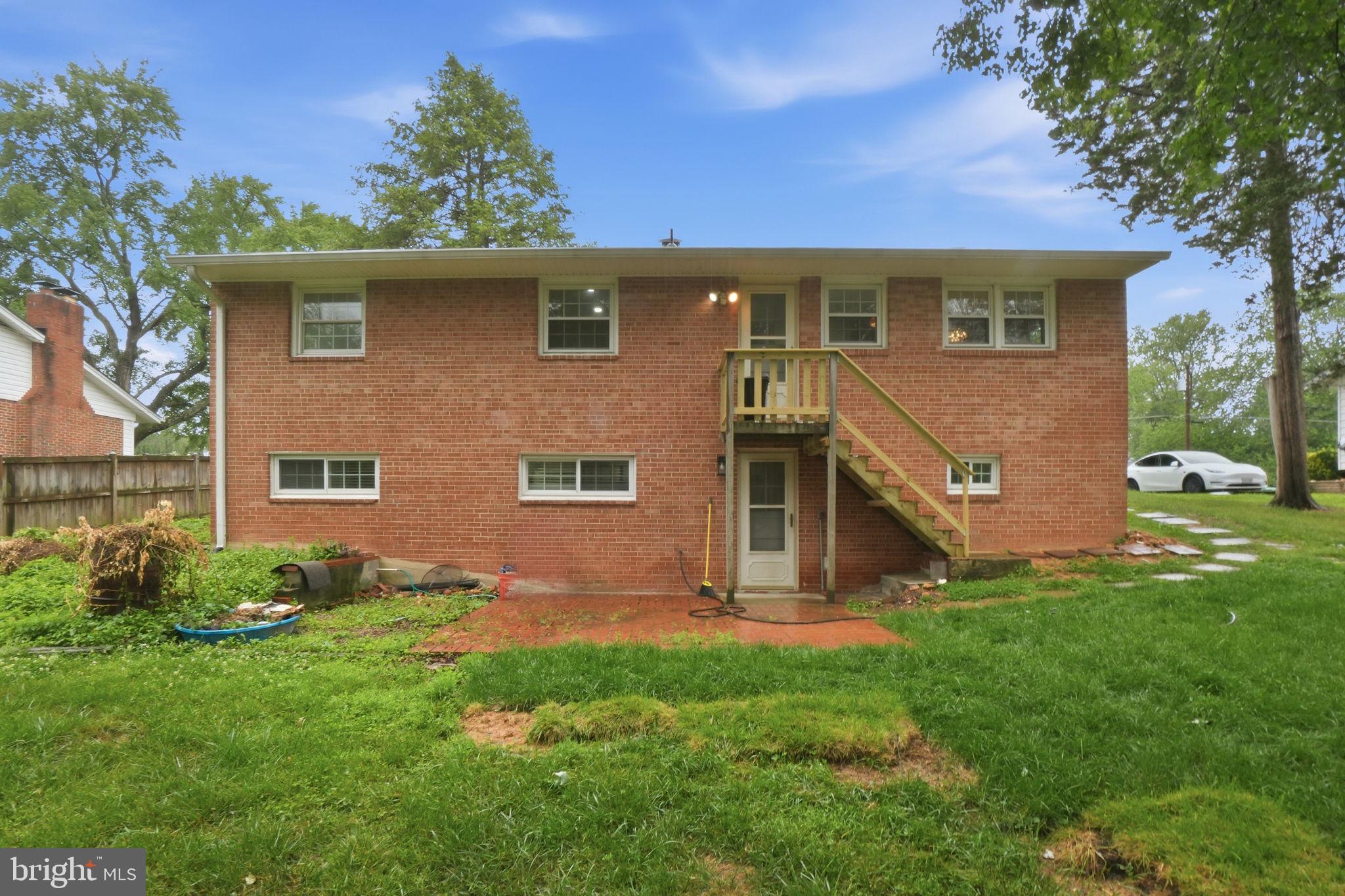 5304 Pillow Lane Springfield, VA 22151 - Photo 31 of 32 front view of a house with a yard