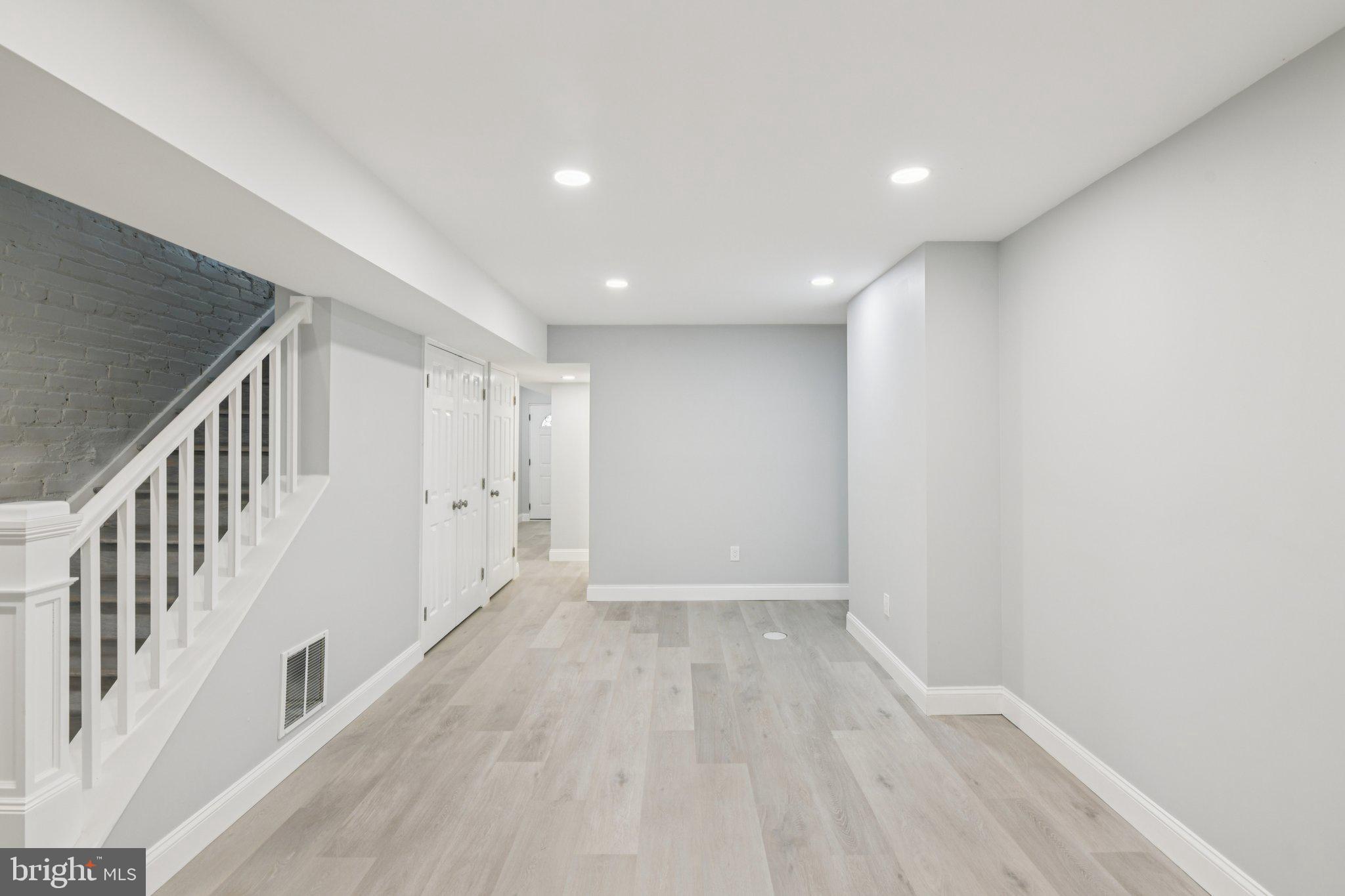 729 Madison Street Northwest Washington, DC 20011 - Photo 46 of 59 a view of an empty room with wooden floor