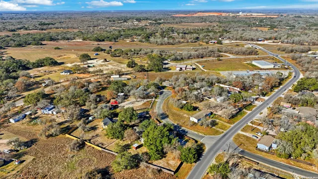 an aerial view of residential house and lake view