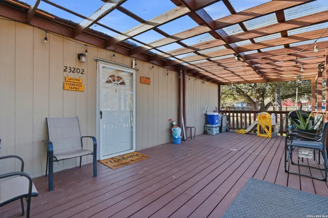 a balcony with wooden floor