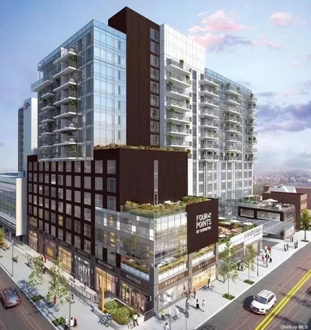 a view of a city with tall buildings