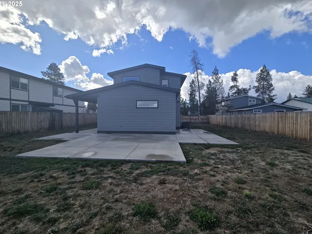 a big yard with lots of flower plants