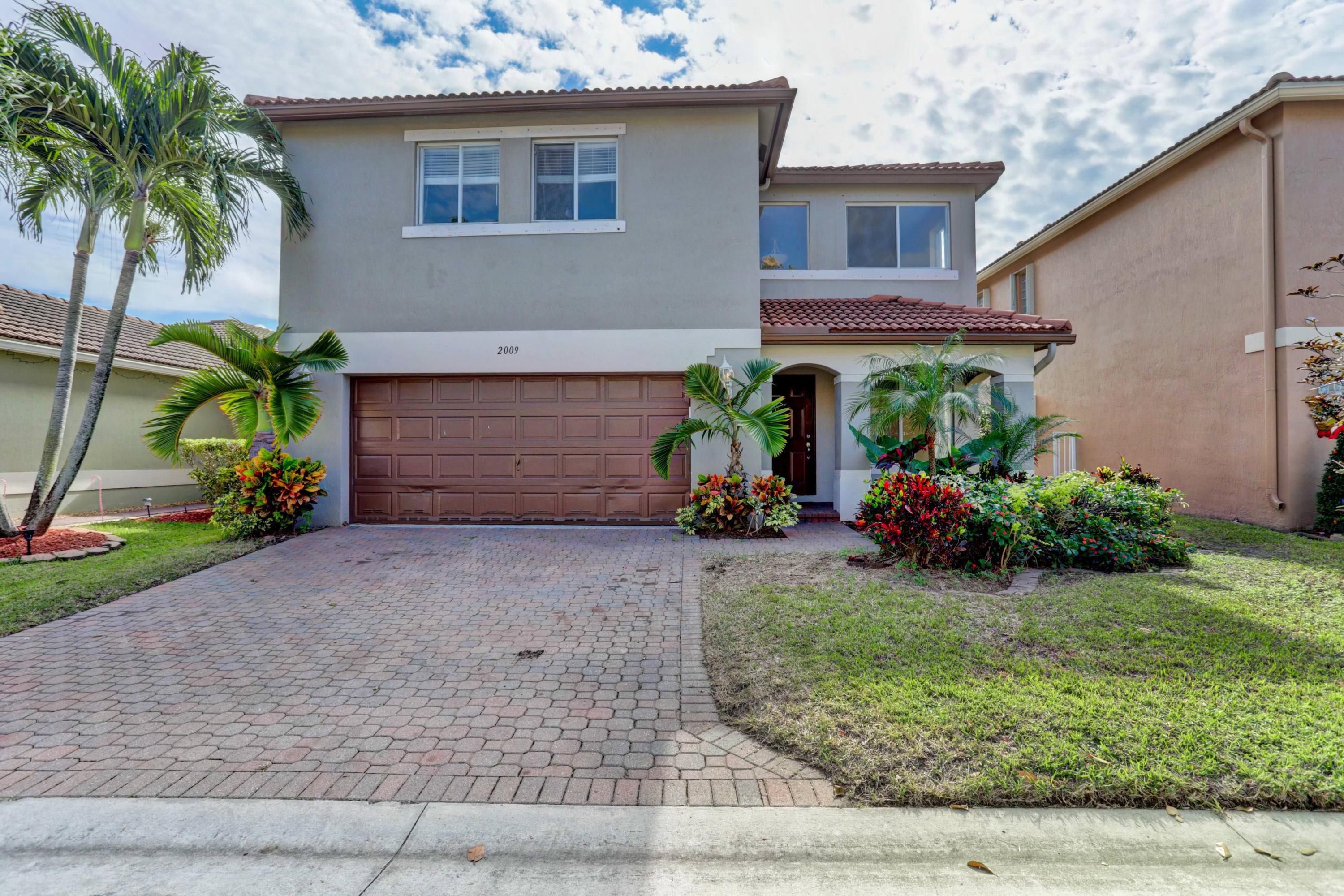 2009 Little Torch Street Riviera Beach, FL 33407 - Photo 1 of 79 02_320a6024_5_6_7_8_airmagic_processed