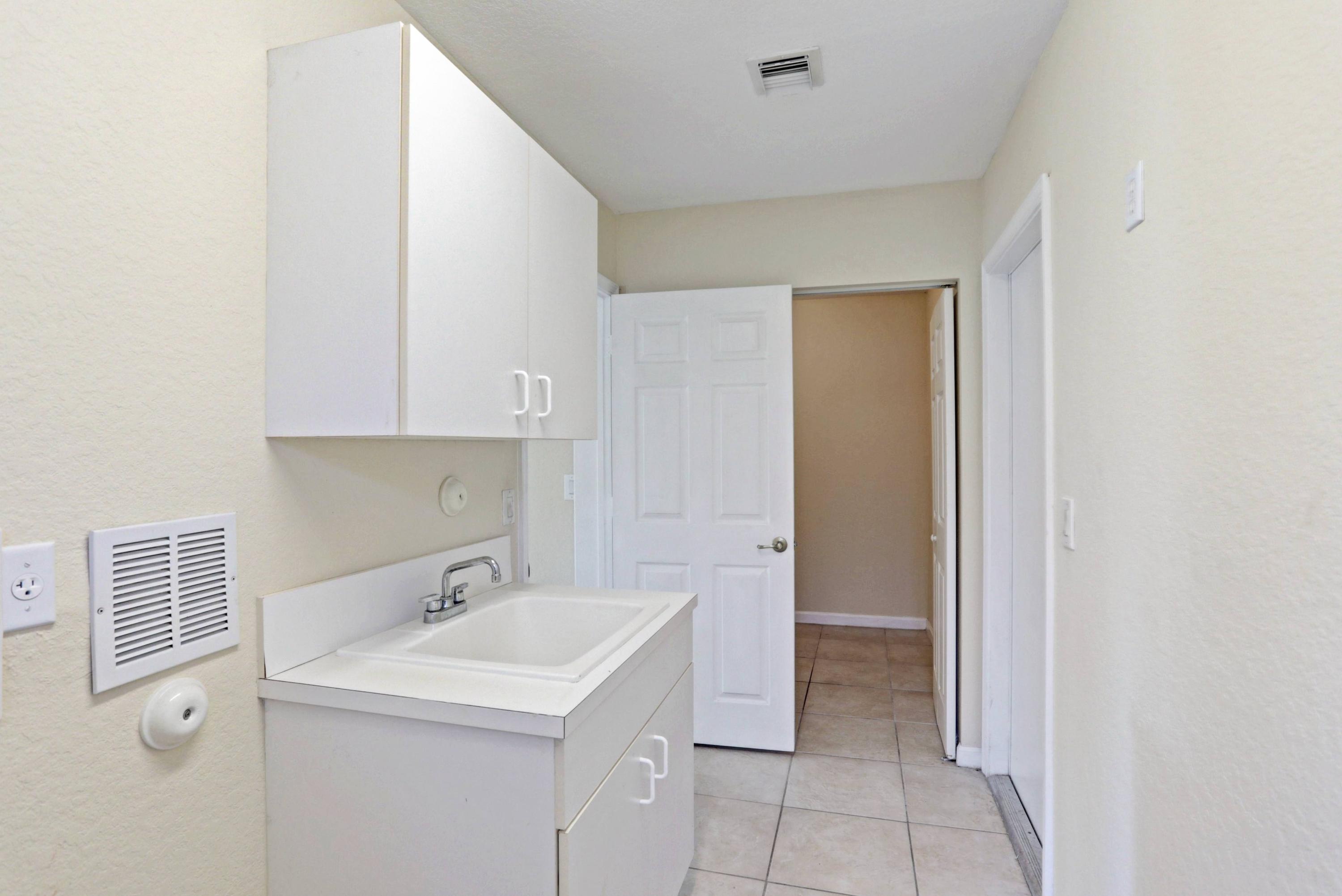 2009 Little Torch Street Riviera Beach, FL 33407 - Photo 33 of 79 31_320a6194_5_6_7_8