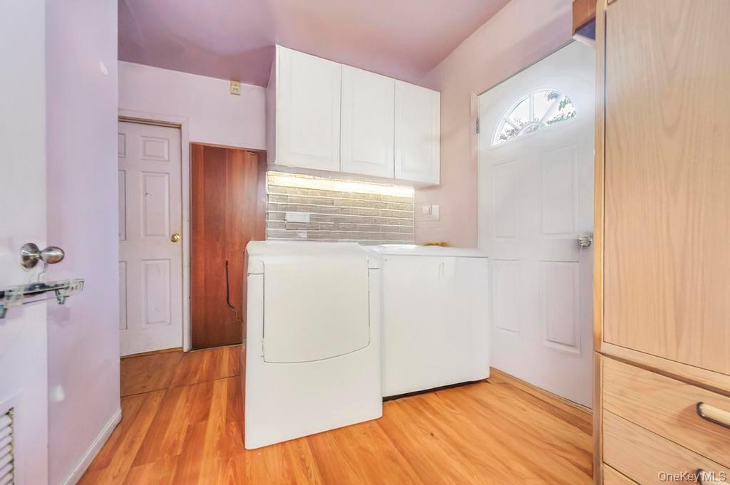 182 Commack Road Deer Park, NY 11729 - Photo 18 of 24 a bathroom with a sink and a mirror