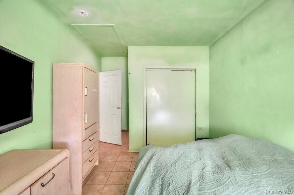 182 Commack Road Deer Park, NY 11729 - Photo 24 of 24 a bathroom with a granite countertop sink a mirror and a shower