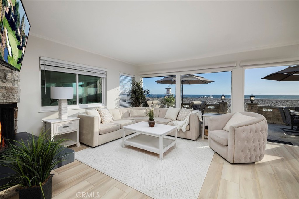 4005 Seashore Drive Newport Beach, CA 92663 - Photo 2 of 32 a living room with furniture and a large window
