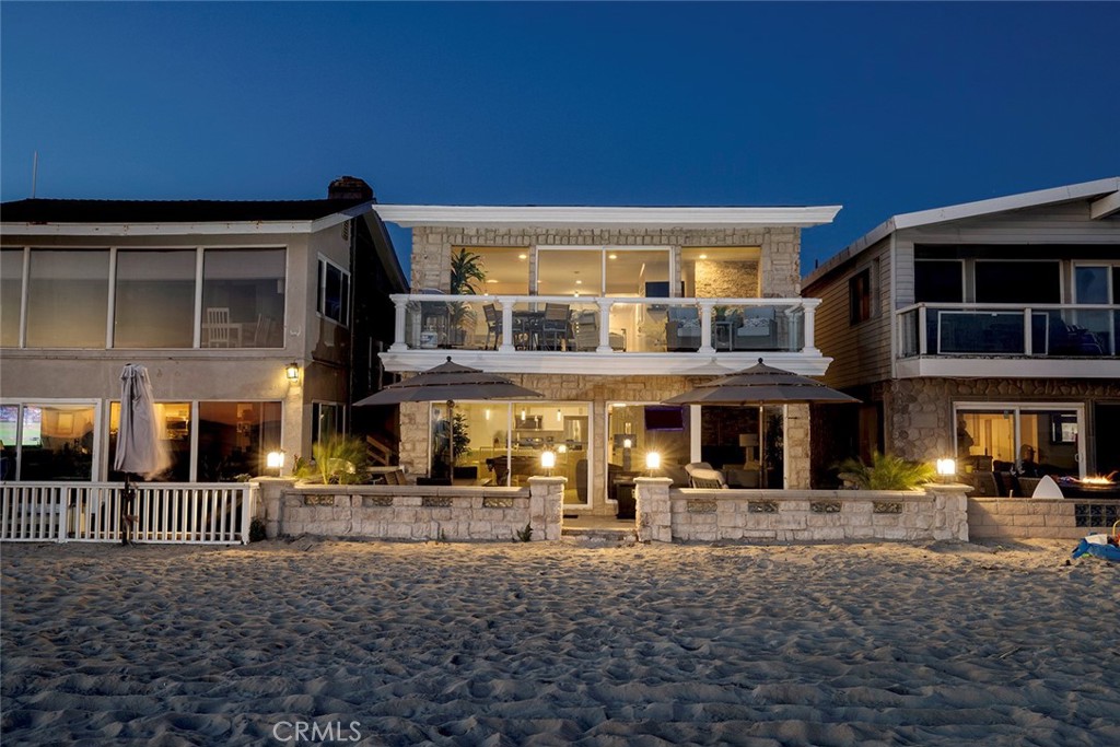 4005 Seashore Drive Newport Beach, CA 92663 - Photo 31 of 32 a front view of a building with street