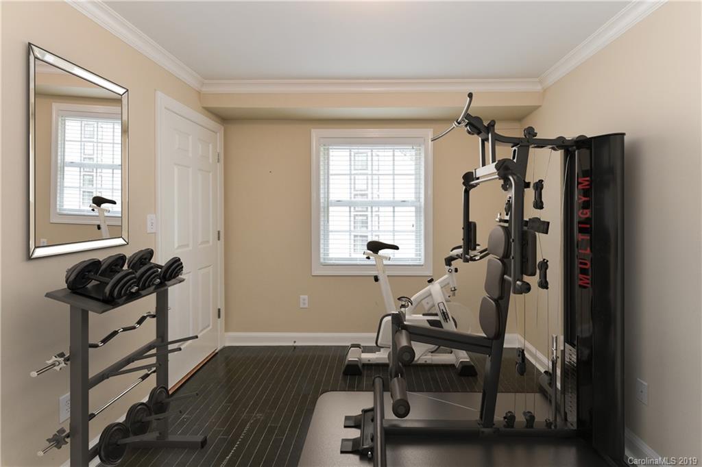 919 Colville Road Charlotte, NC 28207 - Photo 27 of 38 a view of a room with gym equipment