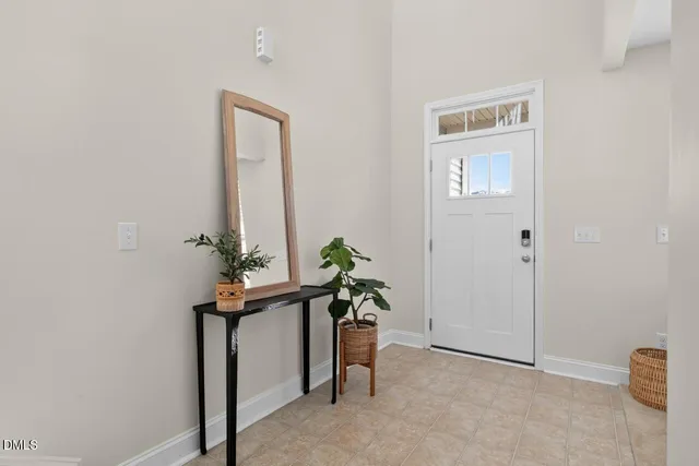 a view of a hallway with front door